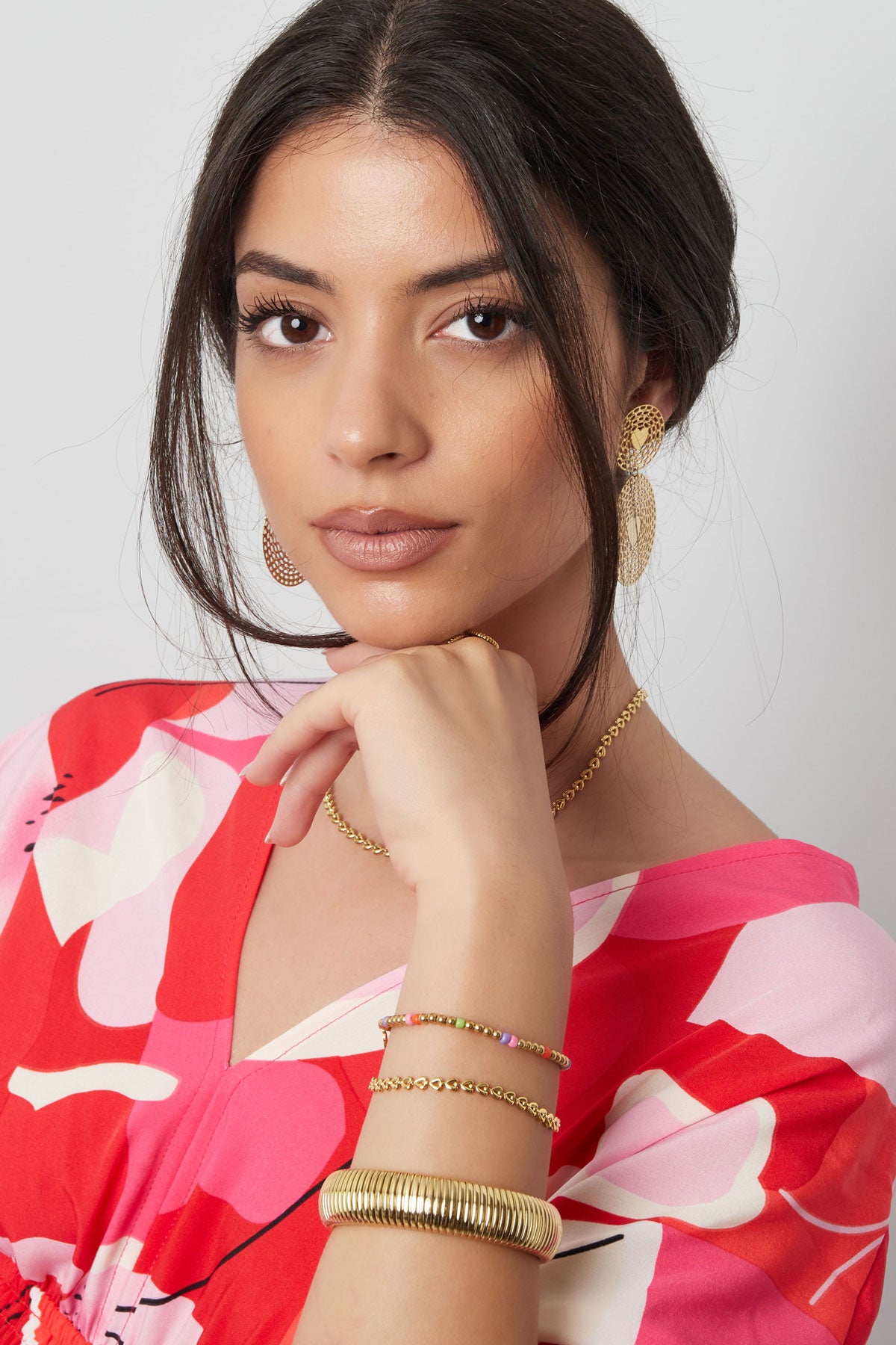 LINKED HEARTS ARMBAND GOUD